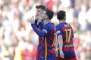 FC Barcelona's Lionel Messi, centre, celebrates after scoring a goal with his teammates during a Spanish La Liga soccer match between Barcelona and Getafe at the Camp Nou stadium in Barcelona, Spain, Saturday, March 12, 2016. (AP Photo/Manu Fernandez)