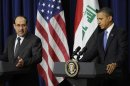 Al-Maliki and Obama hold a joint news conference in the Eisenhower Executive Office Building on the White House campus in Washington
