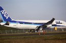 A 787 Dreamliner jet painted in All Nippon Airways (ANA) of Japan livery, sits idle on the tarmac parking at Paine Field in Everett