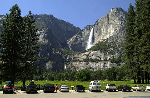 Cars fill a parking lot near Yosemite Falls (David McNew/Getty)