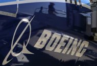 The Boeing logo is seen on a Boeing 787 Dreamliner airplane in Long Beach, California March 14, 2012. REUTERS/Lucy Nicholson