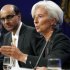 IMF Managing Director Christine Lagarde speaks during a news conference at IMF/ World Bank Annual Meetings at IMF headquarters in Washington, on Saturday, Sept. 24, 2011, as Singapore Finance Minister Tharman Shanmugaratnam, second from left, looks on.(AP Photo/Jose Luis Magana)