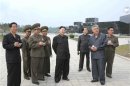 North Korean leader Kim Jong-Un visits the construction of Changjon Street nearing its completion in this undated picture released by the North's official KCNA news agency in Pyongyang