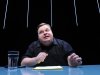 In this undated image released by The Public Theater, Mike Daisey is shown in a scene from "The Agony and The Ecstasy of Steve Jobs," in New York. Daisey, whose latest show has been being credited with sparking probes into how Apple's high-tech devices are made, is finding himself under fire for distorting the truth. The public radio show “This American Life” retracted a story Friday, March 16, 2012, that it broadcast in January about what Daisey said he saw while visiting a factory in China where iPads and iPhones are made. (AP Photo/The Public Theater, Stan Barouh)