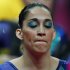 Brazilian gymnast Daniele Matias Hypolito, wears eye makeup in the colors of the national flag, waits to perform during the artistic gymnastics women's qualifications at the 2012 Summer Olympics, Sunday, July 29, 2012, in London. (AP Photo/Matt Dunham)