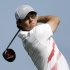 Rory McIlroy, of Northern Ireland, watches his tee shot on the 10th hole during the first round of the Honda Classic golf tournament, Thursday, Feb. 28, 2013, in Palm Beach Gardens, Fla. (AP Photo/Wilfredo Lee)