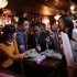 Participants who are singles introduce themselves during a matchmaking party organized by one of the biggest Chinese matchmaking websites in Shanghai, China on Sunday Nov. 11, 2012. Singles Day was begun by Chinese college students in the 1990s as a version of Valentine's Day for people without romantic partners. The timing was based on the date Nov. 11, or "11.11" — four singles. Unattached young people would treat each other to dinner or give gifts to woo that special someone and end their single status. (AP Photo/Eugene Hoshiko)