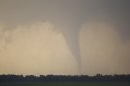 A tornado forms and touches down north of Soloman, Kan., Saturday, April 14, 2012. (AP Photo/Orlin Wagner)