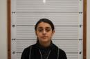 Undated booking picture handout shows Tareena Shakil is seen after her arrest