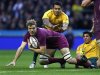 England's Launchbury is tackled by Australia's Ioane during their international Rugby Union match at Twickenham stadium in London
