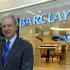File photo of Barclays Plc Chairman Marcus Agius posing at a bank branch near their Canary Wharf headquarters in London