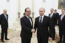 Putin meets Hollande in Moscow