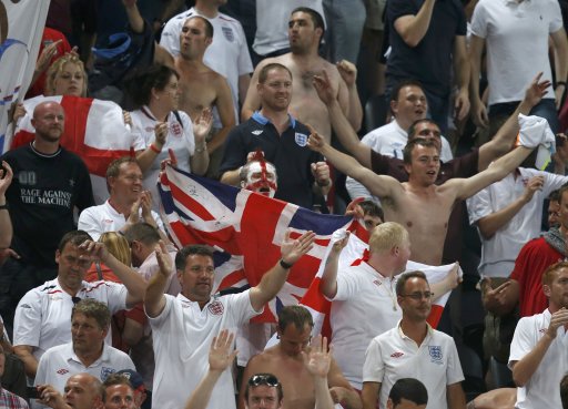 England's soccer fans celebrate victory against Ukraine after their Group D Euro 2012 soccer match at the Donbass Arena in Donetsk