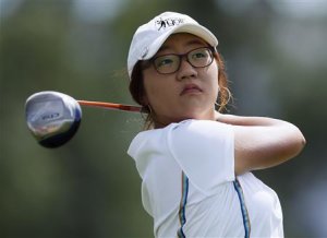 Fifteen-year old amateur Lydia Ko of New Zealand drives …