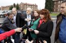 Kari Bales, third from right, stands next to attorney Lance Rosen, third from left, as she listens to her sister, Stephanie Tandberg, second from right, read a statement to reporters Tuesday, Nov. 13, 2012, outside the building housing a military courtroom on Joint Base Lewis McChord in Washington state, where a preliminary hearing ended Tuesday for Kari's husband, U.S. Army Staff Sgt. Robert Bales. Bales is accused of 16 counts of premeditated murder and six counts of attempted murder for a pre-dawn attack on two villages in Kandahar Province in Afghanistan in March of 2012. At right is Stephanie's husband, Eric Tandberg. (AP Photo/Ted S. Warren)