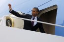 President Barack Obama waves as he boards Air Force One before his departure from Andrews Air Force Base, Md., Tuesday, Sept., 4, 2012. (AP Photo/Pablo Martinez Monsivais)