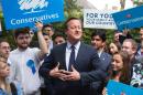 British Prime Minister David Cameron addresses councillors and supporters following the local elections, in Peterborough, central England, on May 6, 2016