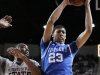 Kentucky forward Anthony Davis (23) hauls in a rebound next to Mississippi State forward Arnett Moultrie (23) in the first half of an NCAA college basketball game in Starkville, Miss., Tuesday, Feb. 21, 2012. (AP Photo/Rogelio V. Solis)
