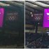 Combination photo shows the South Korea and North Korea flags displayed beside player Song before the start of the women's Olympic soccer match at the London 2012 Olympic Games
