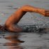 American endurance swimmer Diana Nyad swims in Cuban waters, offshore Havana, Cuba, Sunday, Aug. 7, 2011. Nyad jumped into Cuban waters Sunday evening and set off in a bid to become the first person to swim across the Florida Straits without the aid of a shark cage. (AP Photo/Franklin Reyes)