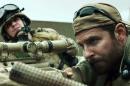In this image released by Warner Bros. Pictures, Kyle Gallner, left, and Bradley Cooper appear in a scene from "American Sniper." The film is based on the autobiography by Chris Kyle. (AP Photo/Warner Bros. Pictures)