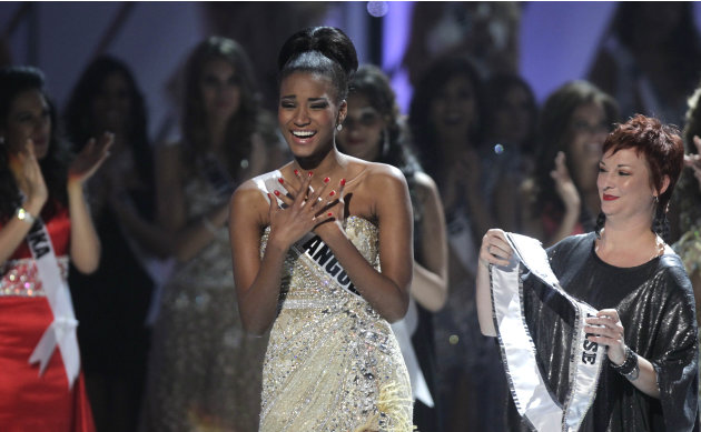 Miss Angola Leila Lopes reacts after being named Miss Universe 2011, before being crowned at the Miss Universe pageant in Sao Paulo, Brazil, Monday Sept. 12, 2011. (AP Photo/Andre Penner)