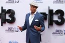 Actor Terrence Howard arrives at the 2013 BET Awards in Los Angeles