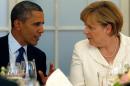 File picture shows US President Barack Obama (L) and German Chancellor Angela Merkel chatting during a dinner at the Charlottenburg palace in Berlin, on June 19, 2013