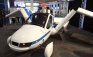 Flying car Terrafugia Transition unfolds wings at the 2012 New York International Auto Show
