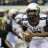 Navy quarterback Keenan Reynolds runs with the ball during the first half of an NCAA college football game against Army, Saturday, Dec. 8, 2012, in Philadelphia. (AP Photo/Matt Slocum)
