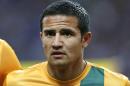 In this Tuesday, June 4, 2013 photo, Australia's Tim Cahill listens to the national anthem before their Asian zone Group B qualifying soccer match for the 2014 World Cup in Saitama, near Tokyo. Australia, featuring World Cup veterans Tim Cahill and captain Mile Jedinak, and Bayer Leverkusen forward Robbie Kruse, plays Kuwait on Friday in a litmus test for both team's prospects in the group. (AP Photo/Shuji Kajiyama)