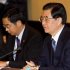 President Hu Jintao, right, President of the People's Republic of China, addresses the U.S. APEC Business Coalition during a meeting at the Sheraton Waikiki, Thursday, Nov. 10, 2011  in Honolulu.  (AP Photo/ Marco Garcia)