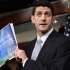 House Budget Committee Chairman Rep. Paul Ryan, R-Wis., holds up a copy of his budget plan entitled "The Path to Prosperity," Tuesday, March 20, 2012, during a news conference on Capitol Hill in Washington. (AP Photo/Jacquelyn Martin)