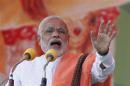 Hindu nationalist Modi, prime ministerial candidate for India's main opposition BJP, addresses a rally in Agra