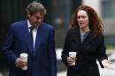 Former News International executive Rebekah Brooks and her husband Charlie arrive at the Old Bailey in central London