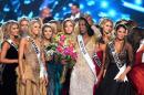 Miss District of Columbia 2016 Deshauna Barber (C) celebrates with the other contestants after she is crowned Miss USA 2016 on June 5, 2016 in Las Vegas, Nevada