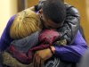 Ma'lik Richmond, 16, top, hugs his mother Daphne Birden, after closing arguments were made on the fourth day of the juvenile trial he and co-defendant Trent Mays, 17, on rape charges  in juvenile court on Saturday, March 16, 2013 in Steubenville, Ohio. Mays and Richmond are accused of raping a 16-year-old West Virginia girl in August, 2012. Judge Thomas Lipps said he would render a decision on Sunday morning, March 17. (AP Photo/Keith Srakocic, Pool)