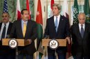 Secretary of State John Kerry, second from right, with the Arab League lead by Qatar's Prime Minister and Foreign Minister Hamad bin Jassim bin Jabr Al-Thani, second from left, and Arab League Secretary-General Nabil Elaraby speaks to the media following their meeting at Blair House in Washington, Monday, April 29, 2013. (AP Photo/Manuel Balce Ceneta)