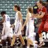 North Carolina State's Marissa Kastanek, right, reacts as Duke players Chelsea Gray (12), Allison Vernerey (43) and Tricia Liston (32) walk off the court after North Carolina State's 75-73 win in an Atlantic Coast Conference NCAA college baketball tournament game in Greensboro, N.C., Friday, March 2, 2012. (AP Photo/Chuck Burton)