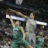 Baylor center Brittney Griner (42) blocks a shot by Notre Dame guard Kayla McBride (23) as Notre Dame forward Markisha Wright (34) watches during the first half in the NCAA women's Final Four college basketball championship game, in Denver, Tuesday, April 3, 2012.  (AP Photo/Julie Jacobson)