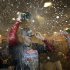 Philadelphia Phillies' Hunter Pence celebrates in the locker room after the Phillies defeated the St. Louis Cardinals, 9-2 in a baseball game to clinch the NL East title Saturday, Sept. 17, 2011, in Philadelphia. (AP Photo/Matt Slocum)