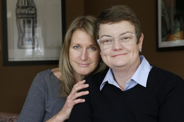 This photo taken Feb. 8, 2013, shows Sandy Stier, left, and Kris Perry, the couple at the center of the Supreme Court's consideration of gay marriage, at their home in Berkeley, Calif. Whatever the outcome of their momentous case, Perry and Stier, who have been together 13 years, will be empty-nesters as the last of their children will heads off to college. (AP Photo/Jeff Chiu)