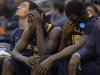 La Salle players watch from the bench as their team goes down to Wichita State 72-58 in their West Regional semifinal in the NCAA college basketball tournament, Thursday, March 28, 2013, in Los Angeles. (AP Photo/Mark J. Terrill)
