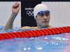 China's Sun Yang celebrates his first place finish in heat 4 of the men's 1500m freestyle event during the London 2012 Olympic Games at the Aquatics Centre