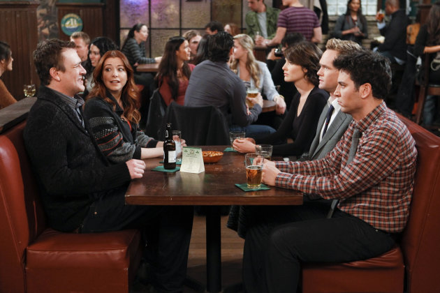 In this image released by CBS, from left, Jason Segel, Alyson Hannigan, Cobie Smulders, Neil Patrick Harris, and Josh Radnor are shown in a scene from "How I Met Your Mother." The comedy is the closest TV has to a modern-day "Friends." It started at a time, in 2005, when networks were desperate to replace that beloved NBC series and the namesake gimmick distinguished it from other wanna-bes. The series opened with kids on a couch impatiently listening to narrator Bob Saget, as Ted circa 2030, explains how their parents met. (AP Photo/CBS, Monty Brinton)