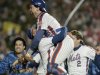 FILE - In this Oct. 27, 1986, file photo, New York Mets Gary Carter is lifted in the air by relief pitcher Jese Orosco following the Met 8-5 victory over the Boston Red Sox in Game 7 of baseballs World Series at New York's Shea Stadium. Baseball Hall of Fame president Jeff Idelson said Thursday, Feb. 16, 2012, that Hall of Fame catcher Gary Carter has died. (AP Photo/Paul Benoit, File)