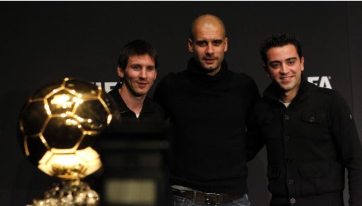 FIFA Men's World Player of the Year 2011 nominees Messi of Argentine and Xavi of Spain pose together with FIFA World Coach Men's Football 2011 nominee Guardiola of Spain before the FIFA Ballon d'Or Gala in Zurich