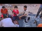Children clean Libyan rebels’ weapons