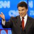 Republican presidential candidate Texas Gov. Rick Perry gestures during a Republican presidential debate Monday, Sept. 12, 2011, in Tampa, Fla. (AP Photo/Mike Carlson)