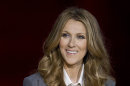 FILE - In this Tuesday March 15, 2011 file photo, Celine Dion answers questions during a press conference after her opening night performance at Caesar's Palace in Las Vegas. Singer Celine Dion has canceled several upcoming concerts in Las Vegas because of a virus. (AP Photo/Julie Jacobson, File)